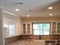 115 Baseline - Here is the left side view of the kitchen after remodel.  Several cabinets had to be rebuilt, electrical had to be fixed and new above slab plumbing had to be installed, all done by Oak Point Wood Works.
