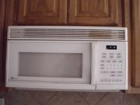 Microwave was cracked in several places on the door and handle.