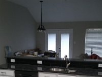 Here is another look at the kitchen, looking toward the living and dining area.