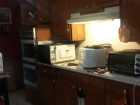 Here is what the garage side of the kitchen looked like when we bought the house.