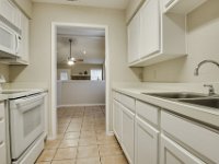 Wall color was also lightened to make the kitchen feel larger.